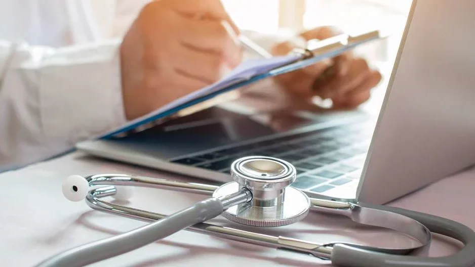 Doctor on laptop