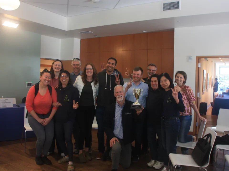 Pharm faculty celebrating trivia win at retreat