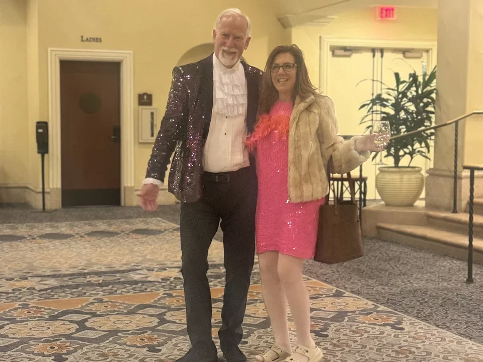 dept chair and wife in costume at retreat