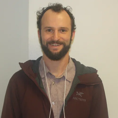 Male in maroon sweatshirt 