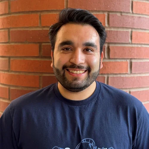 male in navy blue shirt