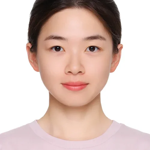 woman with black hair and pink shirt