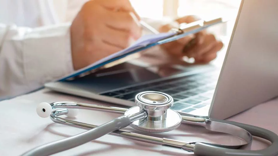 Doctor on laptop